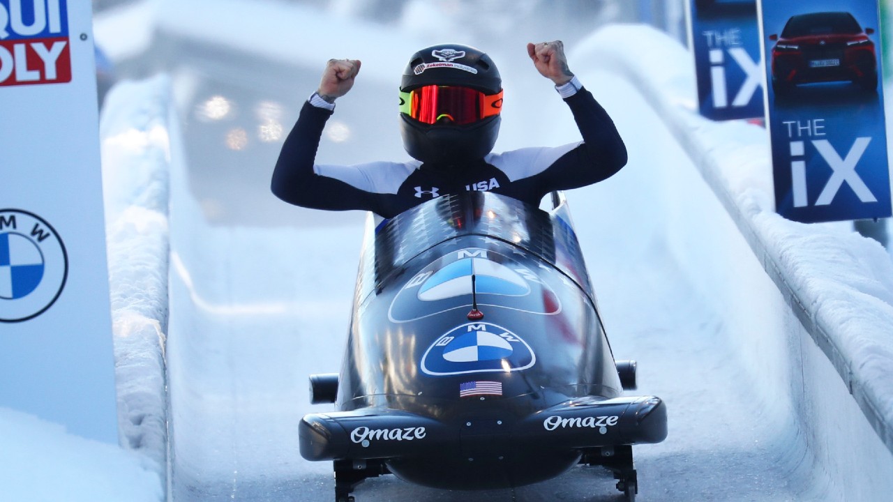 Bobsleigh pilot Kaillie Humphries of the United States reacts at the finish line after taking first place during the women's monobob race at the Bobsleigh and Skeleton World Championships in Altenberg, Germany, Sunday, Feb.14, 2021. (Matthias Schrader/AP)