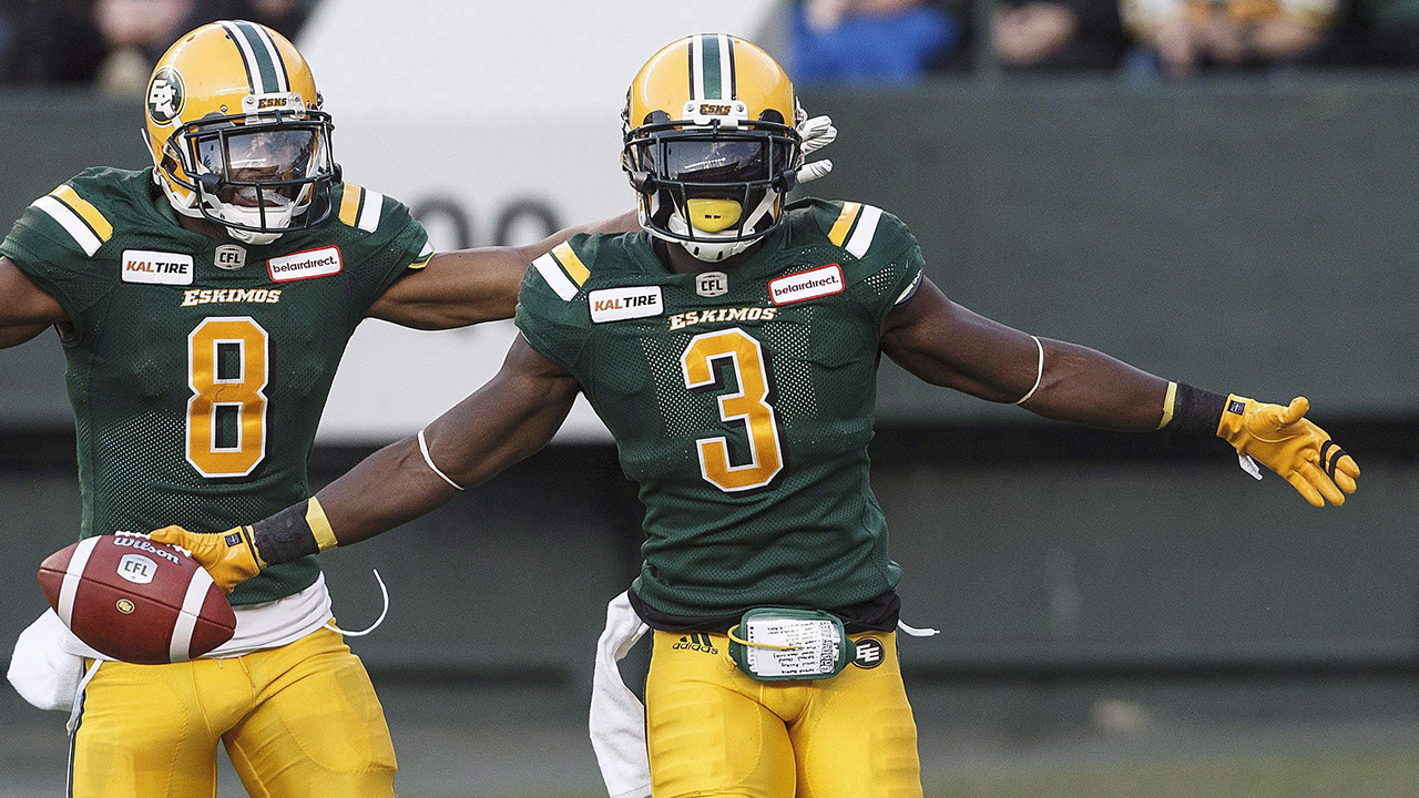 Natey Adjei (3) celebrate a touchdown against the B.C. Lions during first half CFL action in Edmonton on June 29, 2018. (Jason Franson/CP)