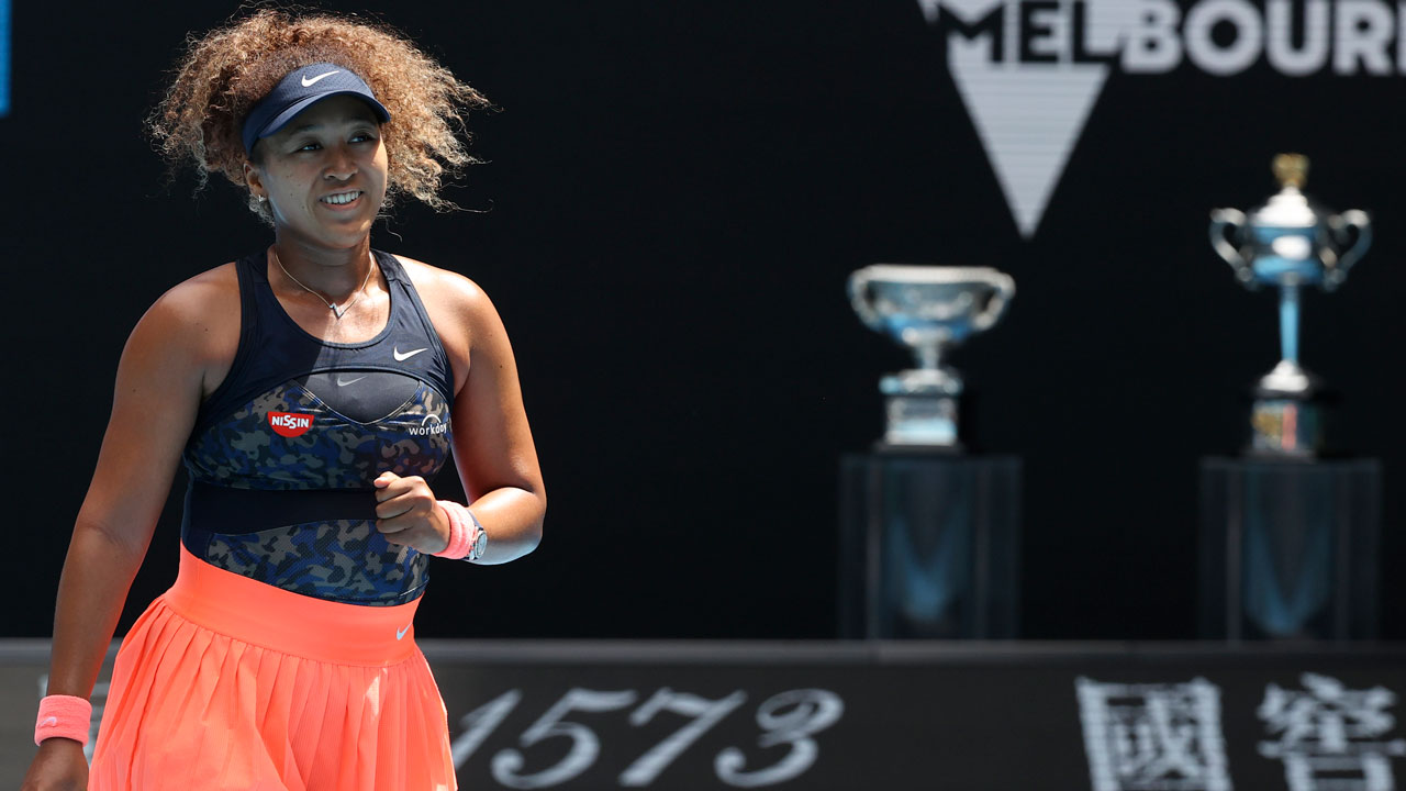 Japan's Naomi Osaka reacts after defeating Taiwan's Hsieh Su-wei in their quarterfinal match at the Australian Open tennis championship in Melbourne. (Hamish Blair/AP)