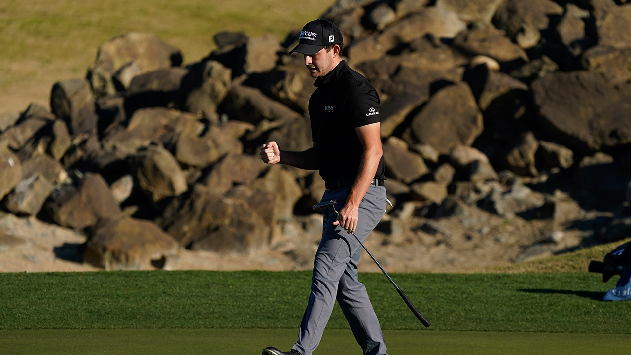 Patrick Cantlay reacts after making a birdie putt on the 18th hole during the final round of the American Express golf tournament on the Pete Dye Stadium Course at PGA West Sunday, Jan. 24, 2021, in La Quinta, Calif. (Marcio Jose Sanchez/AP)