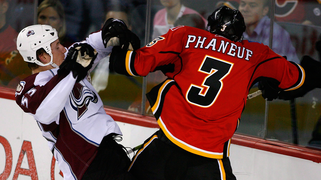 Colorado Avalanche's Cody McLeod, left, collides with Calgary Flames' Dion Phaneuf, right, during second period NHL hockey action in Calgary on Tuesday Oct. 14, 2008. (Larry MacDougal/CP)