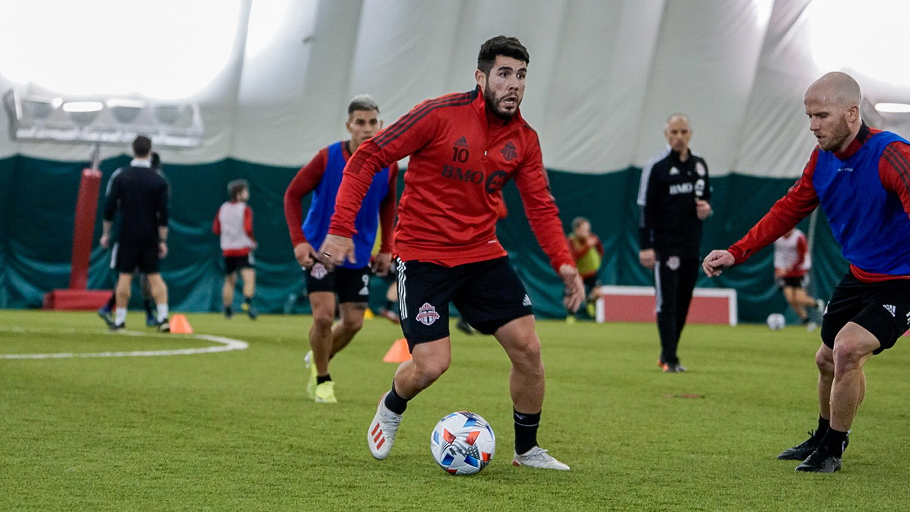 Alejandro Pozuelo dribbles the ball during a training session in Toronto on Wednesday, February 17, 2021. (HO - Toronto FC/CP)