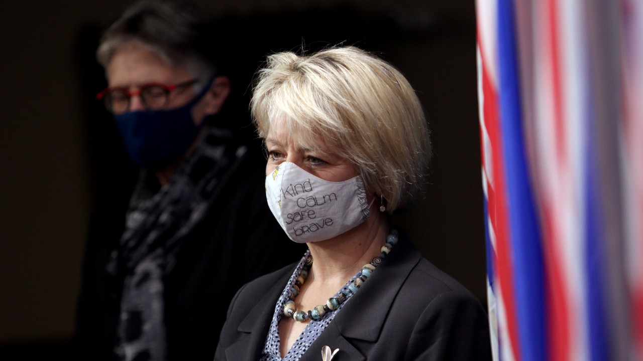 Dr. Bonnie Henry is joined by Dr. Penny Ballem as they arrive to talk about phase two in B.C.'s COVID-19 immunization plan during a press conference at Legislature in Victoria, B.C., on Monday, March 1, 2021. (Chad Hipolito / CP)