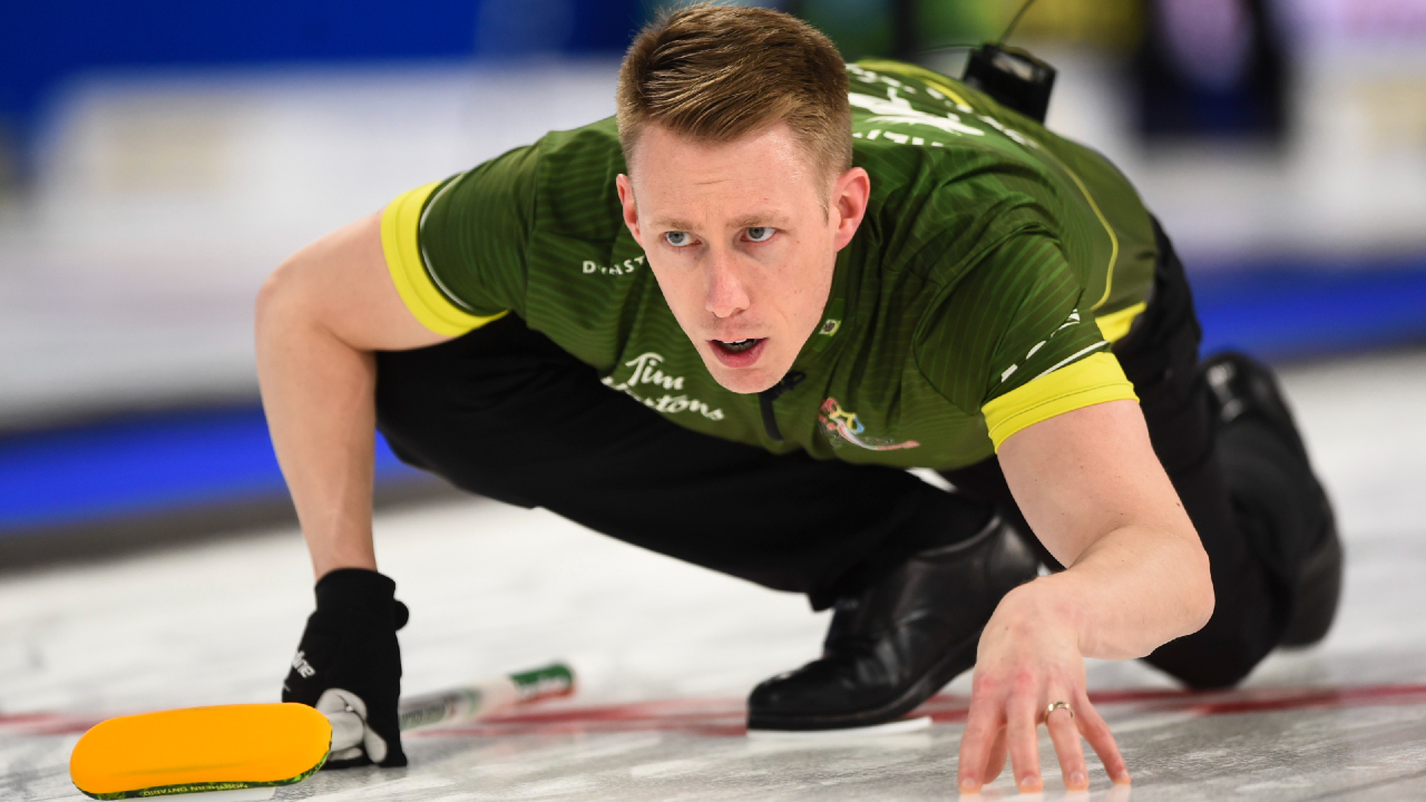 Team Northern Ontario third Marc Kennedy throws as they take on Team Canada during the championship round at the Brier in Kingston, Ont., on Friday, March 6, 2020. (THE CANADIAN PRESS/Sean Kilpatrick)