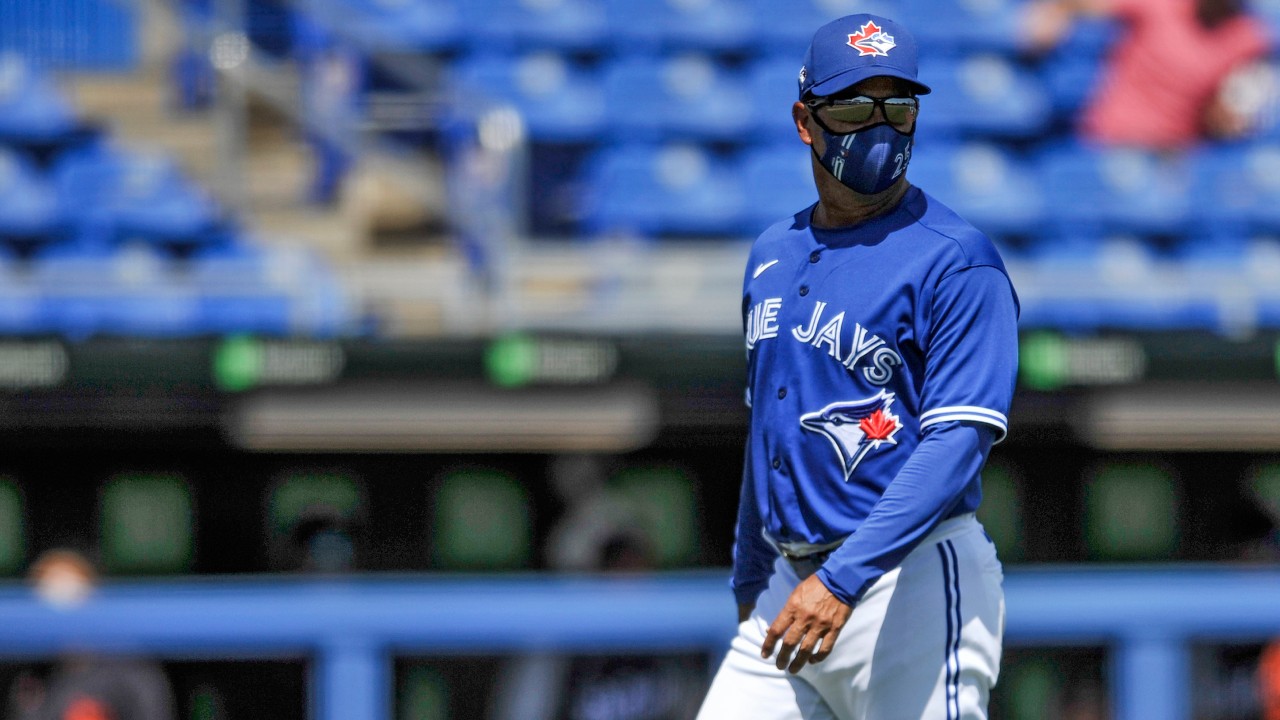 Toronto Blue Jays manager Charlie Montoyo walks to the dugout after making a pitching change during the sixth inning of a spring training baseball game against the Detroit Tigers in Dunedin, Fla. on Sunday, March 28, 2021. (Steve Nesius / CP)