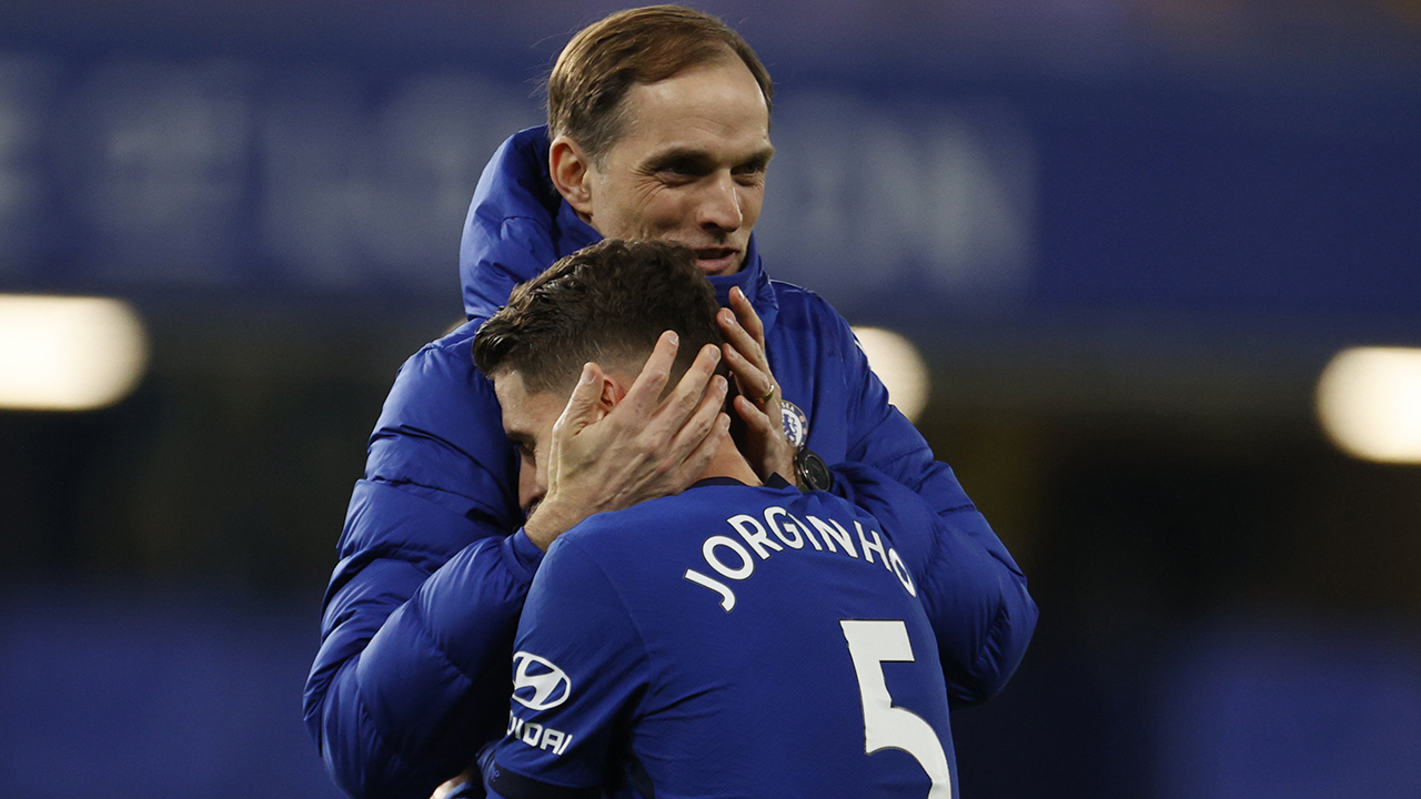 Chelsea's head coach Thomas Tuchel embraces  Jorginho at the end of win against Everton, Monday, March 8, 2021. (John Sibley/AP)