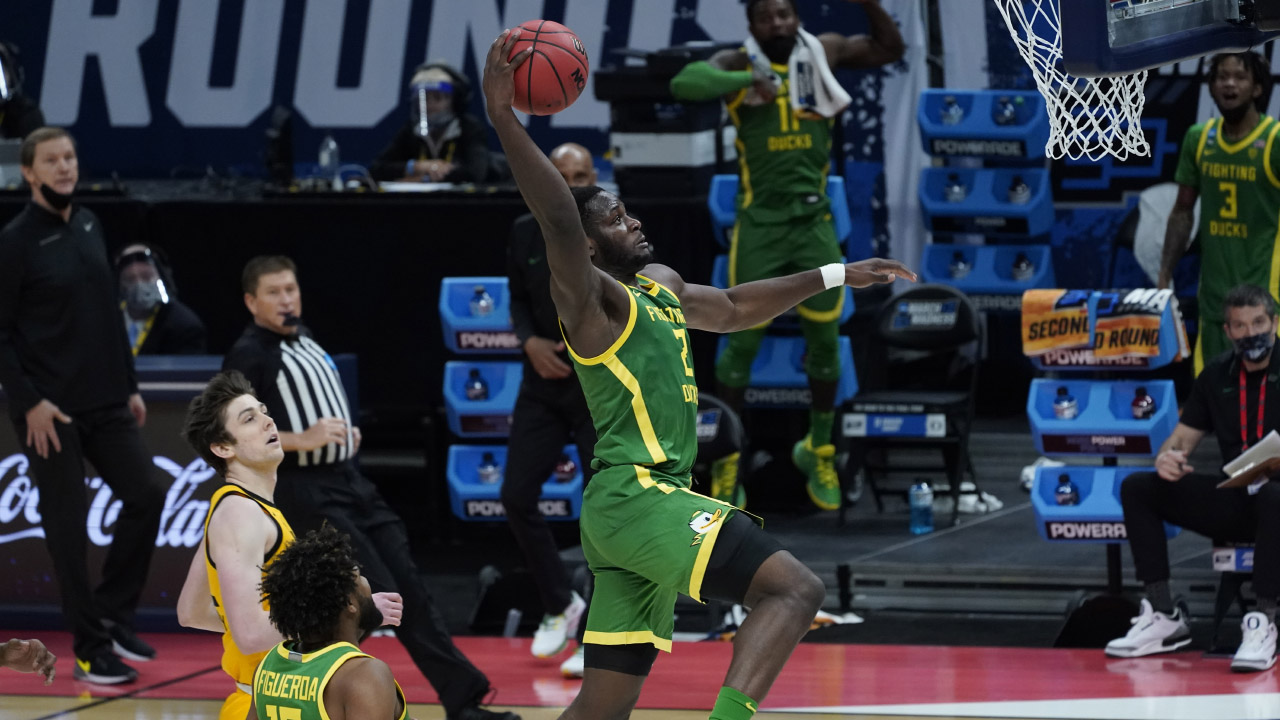 Oregon forward Eugene Omoruyi (2) dunks against Iowa during the second half of a men's college basketball game in the second round of the NCAA tournament at . (Paul Sancya/AP)