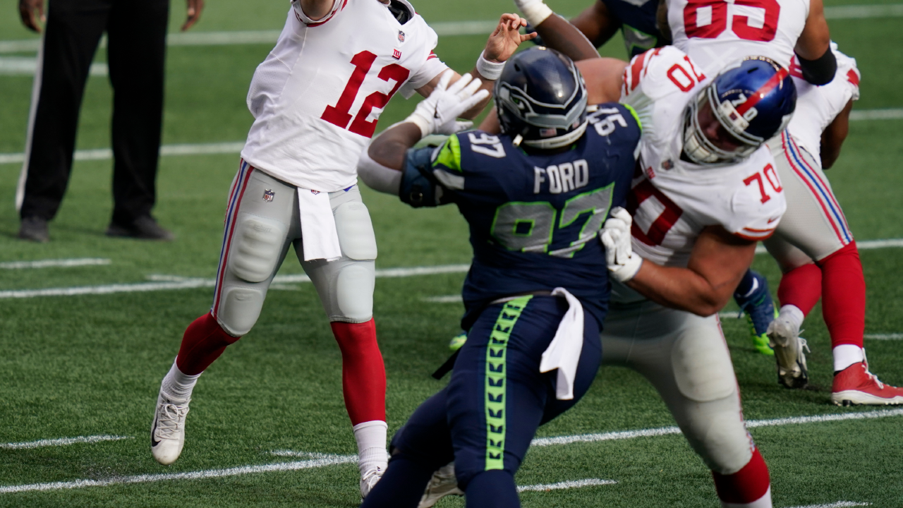 Offensive guard Kevin Zeitler (70) blocks Seattle Seahawks defensive tackle Poona Ford (97) during the first half of an NFL football game, Sunday, Dec. 6, 2020, in Seattle. (Elaine Thompson/AP)