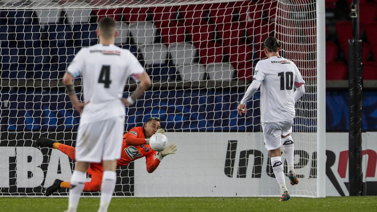PSG's goalkeeper Keylor Navas saves a penalty shot during the French Cup soccer match between PSG and Lille at the Parc des Princes stadium in Paris, France. (Thibault Camus/AP)
