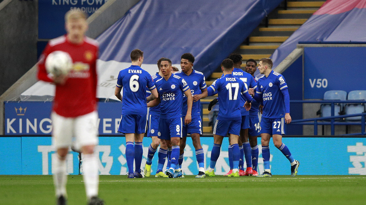Leicester's Kelechi Iheanacho celebrates with teammates after scoring during the English FA Cup quarter final soccer match between Leicester City and Manchester United. (Ian Walton/AP)