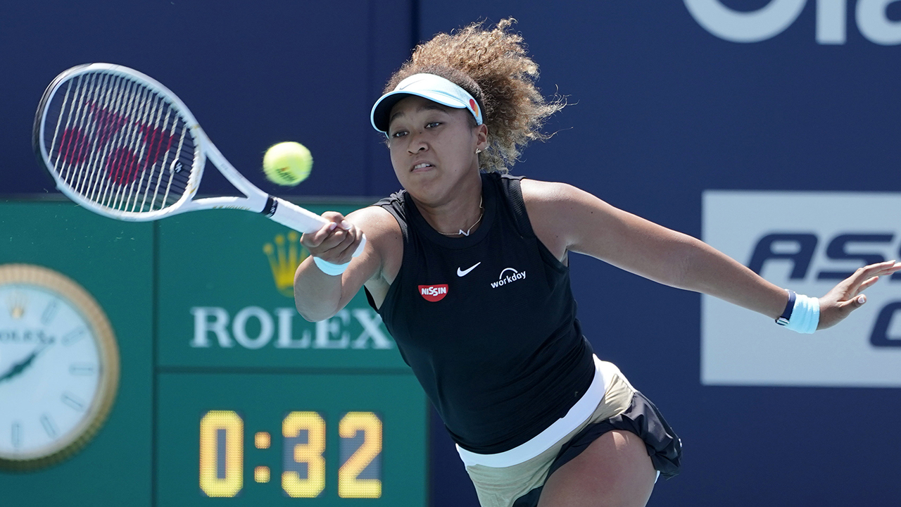Naomi Osaka of Japan returns to Ajla Tomljanovic of Australia during the Miami Open tennis tournament, Friday, March 26, 2021, in Miami Gardens, Fla. (Marta Lavandier/AP)
