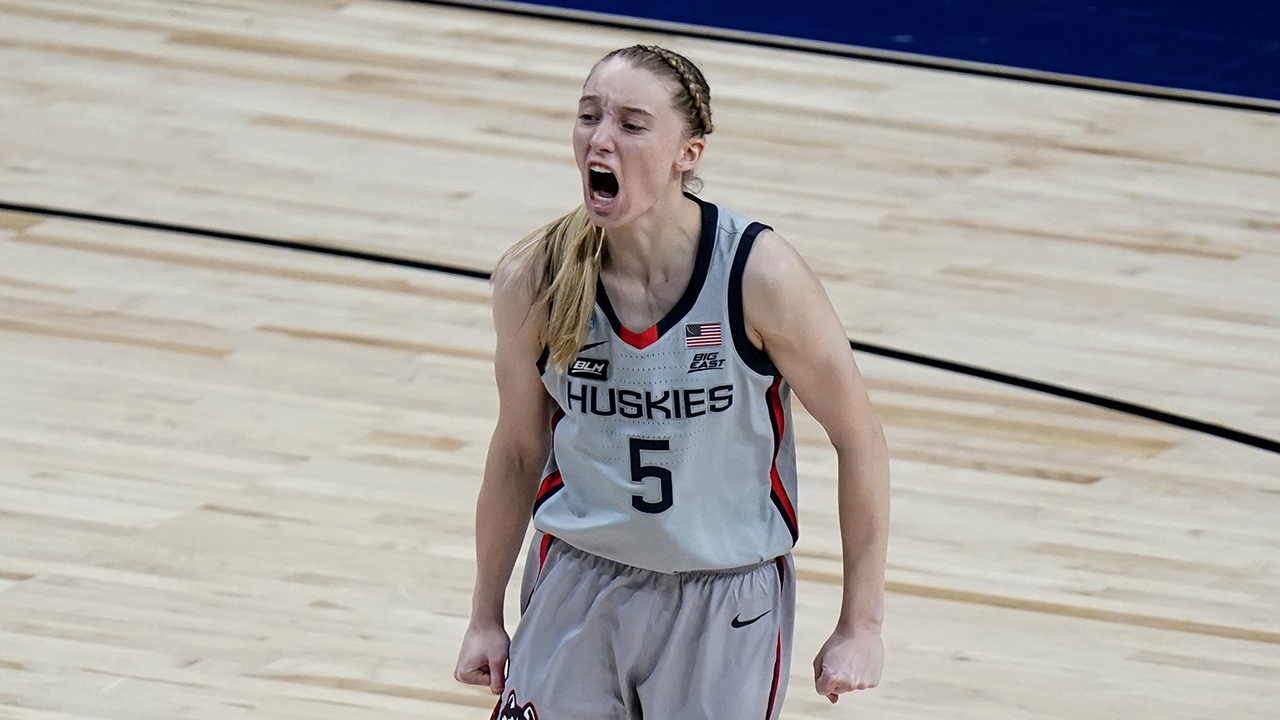 UConn guard Paige Bueckers (5) celebrates a score against Baylor during the second half of a college basketball game in the Elite Eight. (Eric Gay/AP)