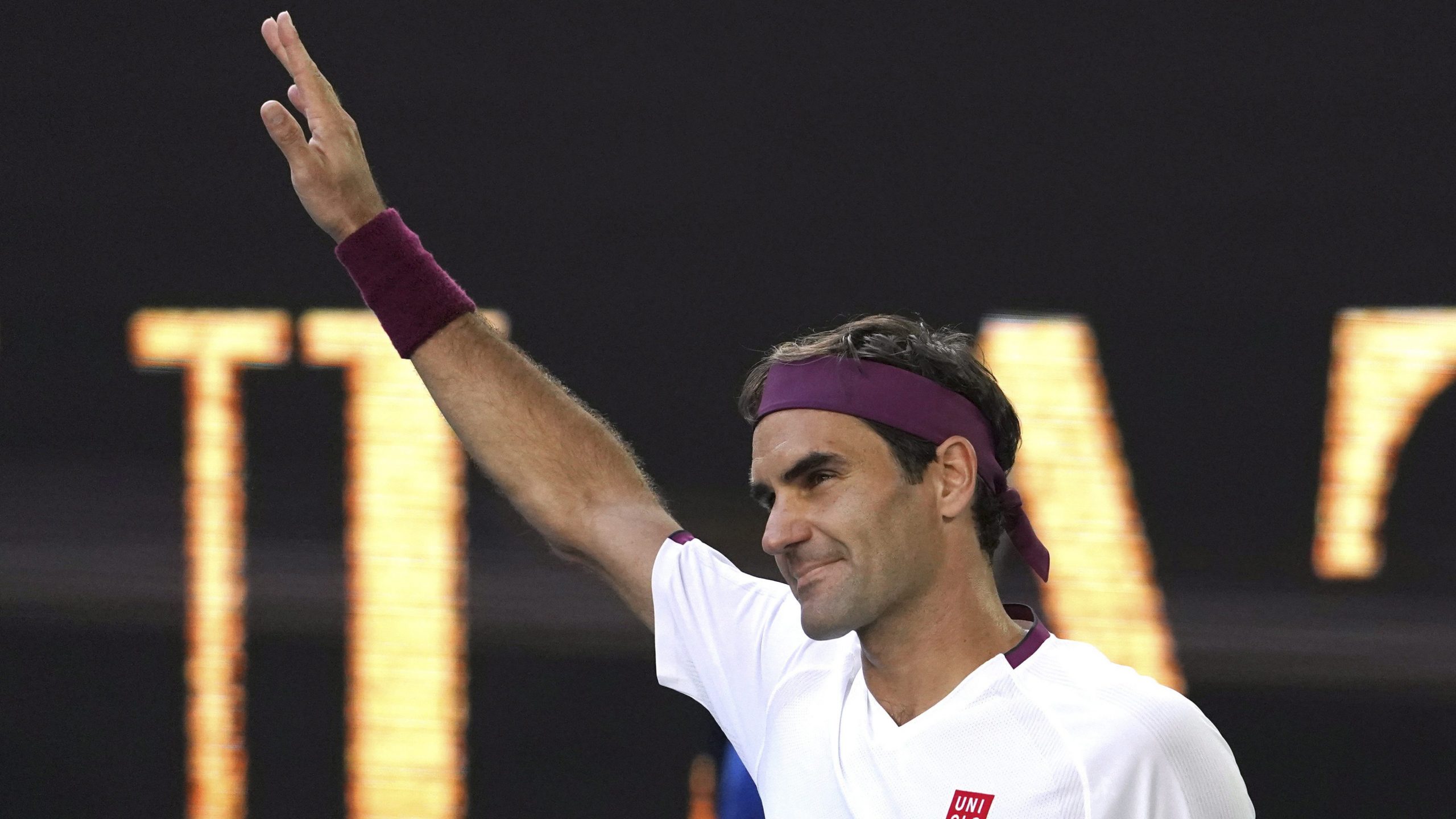 Switzerland's Roger Federer reacts after defeating Tennys Sandgren in the 2020 Australian Open. (Lee Jin-man/AP)