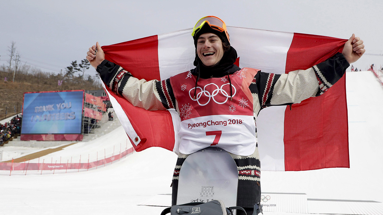 Sebastien Toutant, of Canada, celebrates after winning the gold medal in the men's Big Air snowboard competition at the 2018 Winter Olympics in Pyeongchang, South Korea. (Matthias Schrader/AP)
