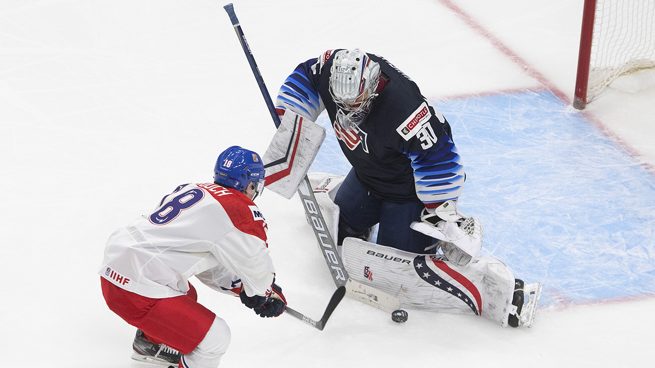 United States' goalie Spencer Knight (30) makes the save on Czech Republic's David Vitouch (18) during third period IIHF World Junior Hockey Championship action in Edmonton on Tuesday, December 29, 2020. (Jason Franson/CP)