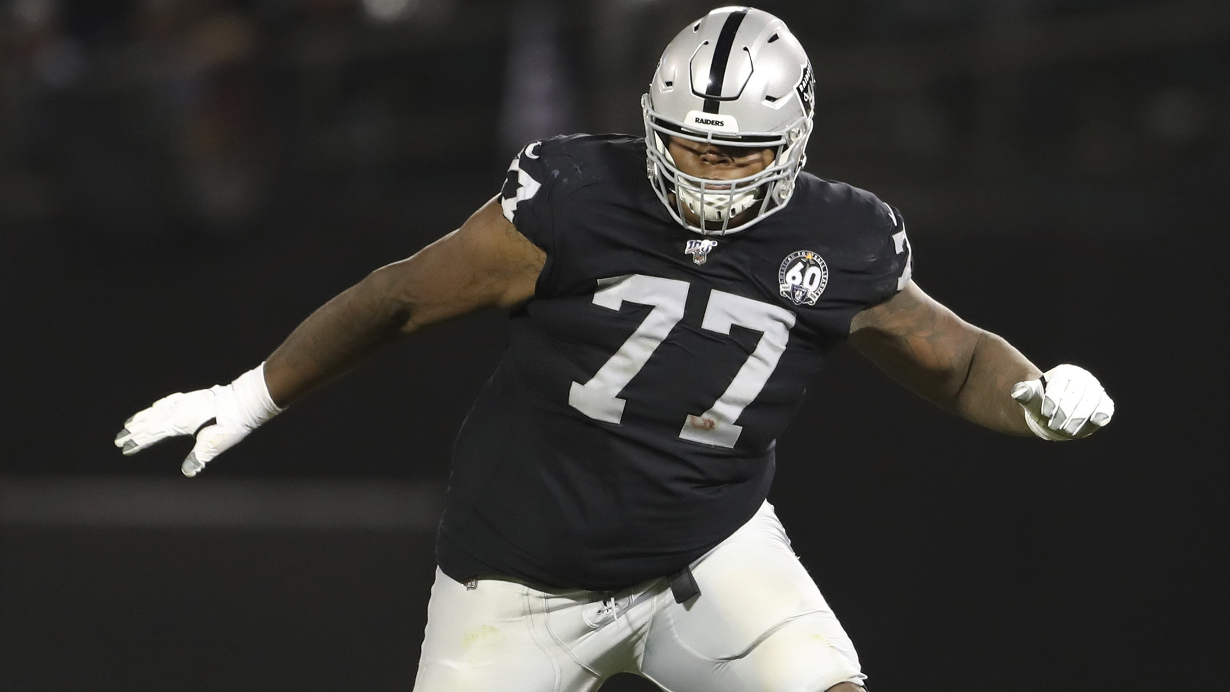 Former Las Vegas Raiders offensive tackle Trent Brown protects a gap in the offensive line during a game against the Denver Broncos. (Peter Joneleit/AP)
