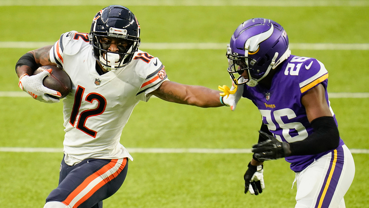 Chicago Bears wide receiver Allen Robinson II (12) runs from Minnesota Vikings cornerback Chris Jones (26) after catching a pass during the second half, Sunday, Dec. 20, 2020, in Minneapolis. (Jim Mone/AP)
