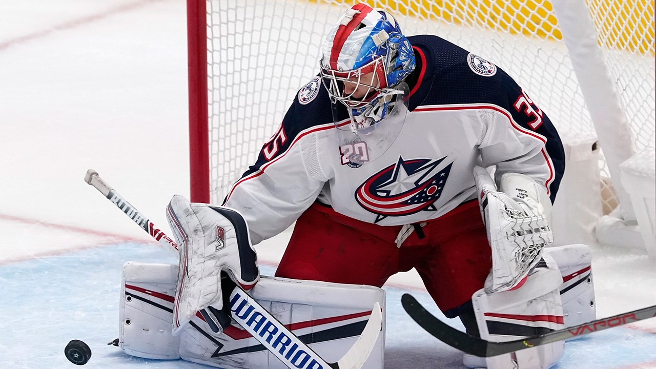 Columbus Blue Jackets goaltender Veini Vehvilainen deflects a shot from the Dallas Stars away from the net in the third period in Dallas, Saturday, March 6, 2021. (Tony Gutierrez/AP)