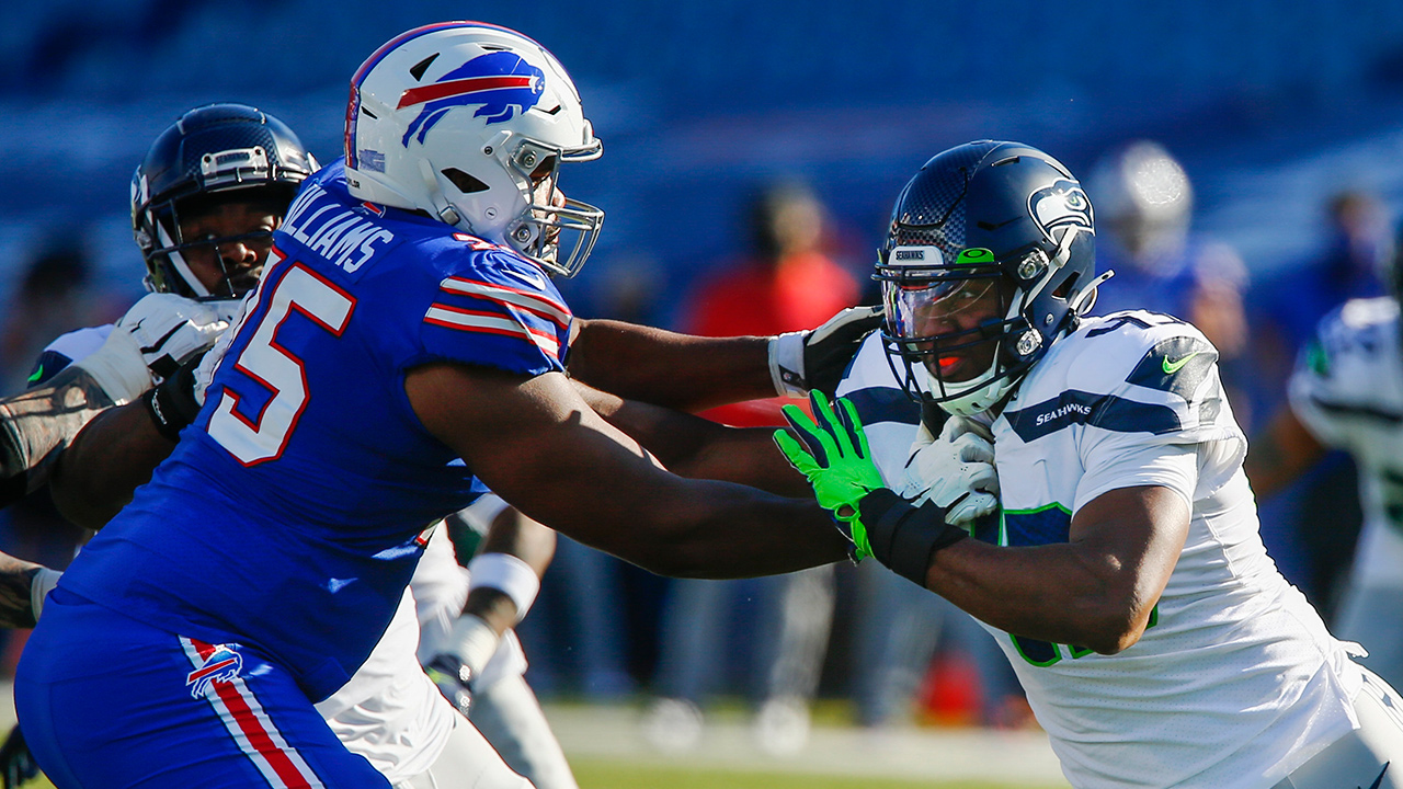 Seattle Seahawks Carlos Dunlap, right, works to get past Buffalo Bills offensive tackle Daryl Williams (75) during the first half on Sunday, Nov. 8, 2020, in Orchard Park, N.Y. (John Munson/AP)