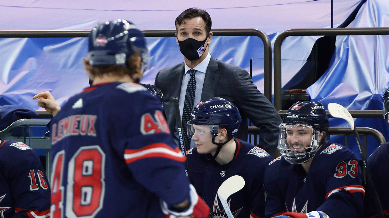 New York Rangers coach David Quinn stands behind the bench during the team's NHL hockey game against the Washington Capitals on Thursday, Feb. 4, 2021, in New York. (Bruce Bennett/Pool Photo via AP)