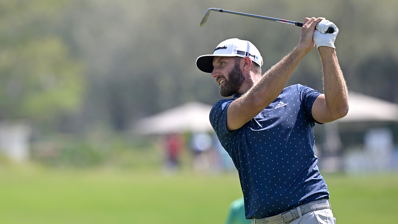 Dustin Johnson watches his shot from the 10th fairway during the final round of the Workday Championship golf tournament Sunday, Feb. 28, 2021, in Bradenton, Fla. (Phelan M. Ebenhack/AP)