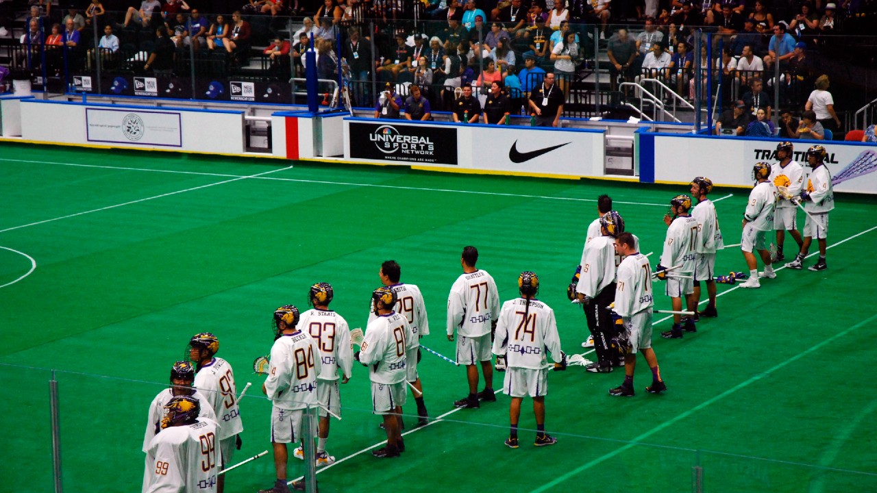 This Sept. 18, 2015 photo shows the Iroquois Nationals lacrosse team line up prior to competing in the 2015 World Indoor Lacrosse Championships on the Onondaga Nation just south of Syracuse, New York. (Jourdan Bennett-Begaye/Indian Country Today via AP)