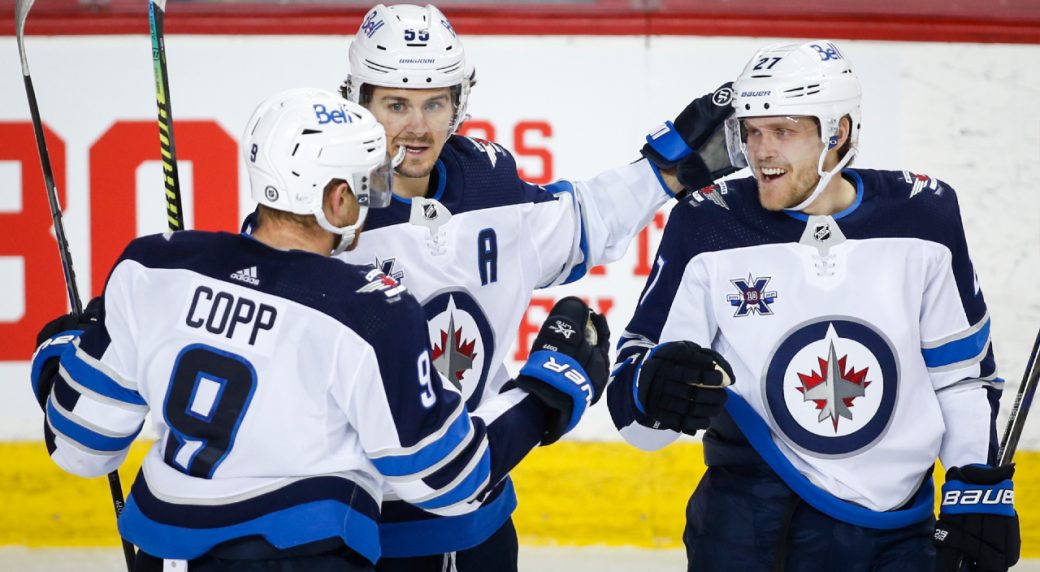 Scheifele scores twice, leading Jets to victory over Flames