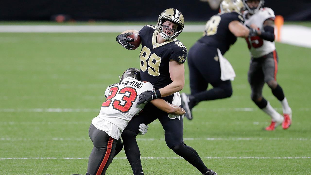 Tampa Bay Buccaneers cornerback Sean Murphy-Bunting (23) hits New Orleans Saints tight end Josh Hill (89) during the first half of an NFL divisional round playoff football game, Sunday, Jan. 17, 2021, in New Orleans. (Brett Duke/AP)