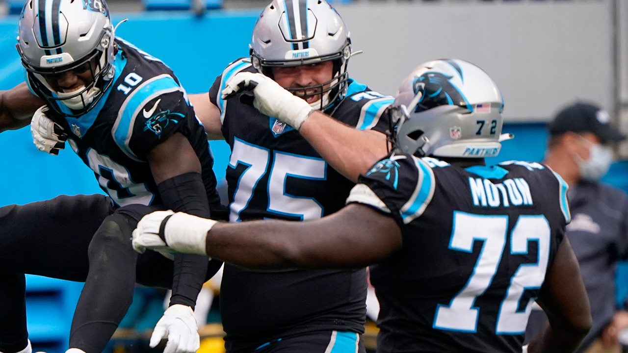 Carolina Panthers wide receiver Curtis Samuel, left, celebrates after scoring with Michael Schofield and Taylor Moton during the second half of an NFL football game against the Detroit Lions Sunday, Nov. 22, 2020, in Charlotte, N.C. (Brian Blanco/AP)