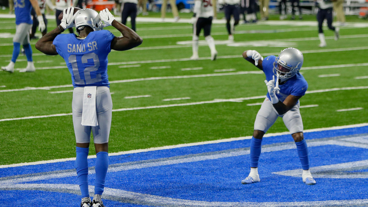 Detroit Lions wide receiver Mohamed Sanu (12) celebrates his touchdown with wide receiver Marvin Jones during the second half of an NFL football game. (Duane Burleson/AP)