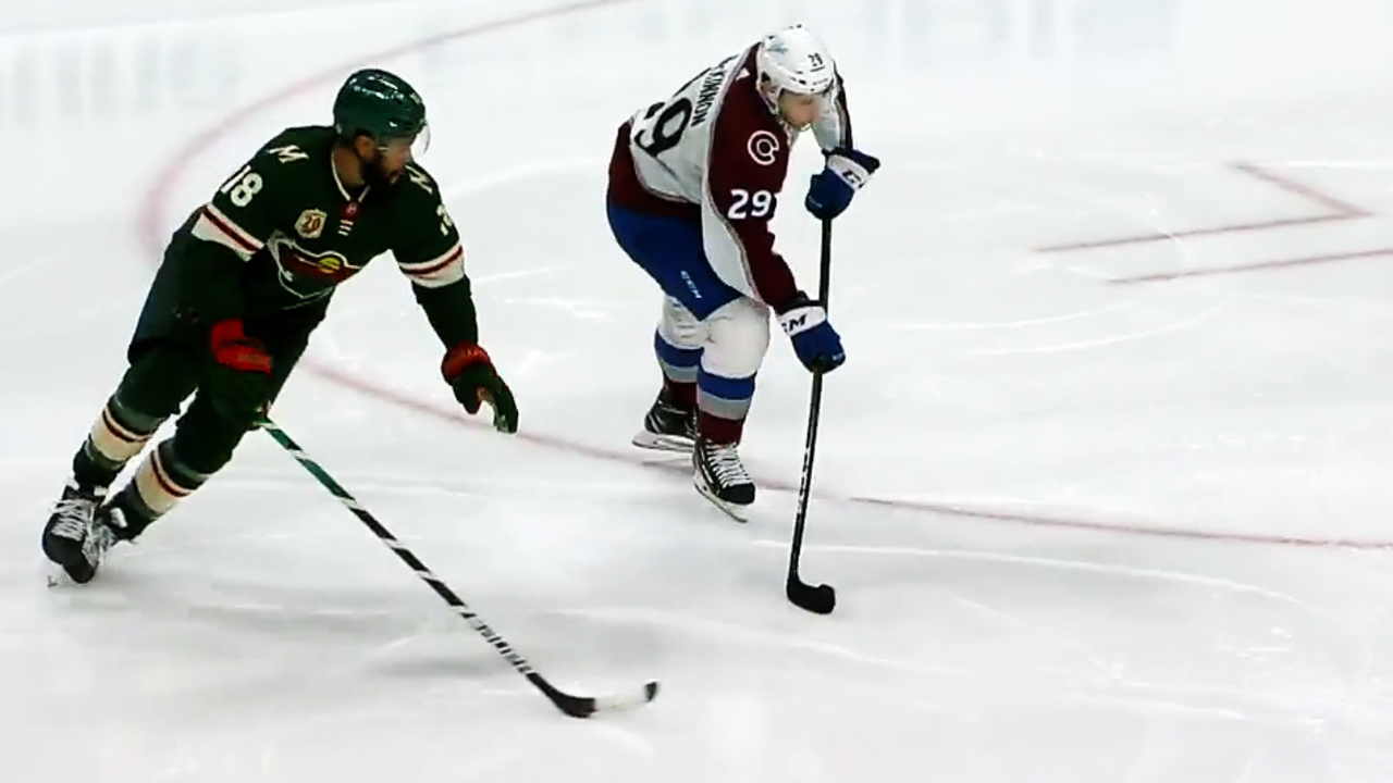 Watch: Wild's Cam Talbot gets slap shot stuck in his face mask - Bring Me  The News
