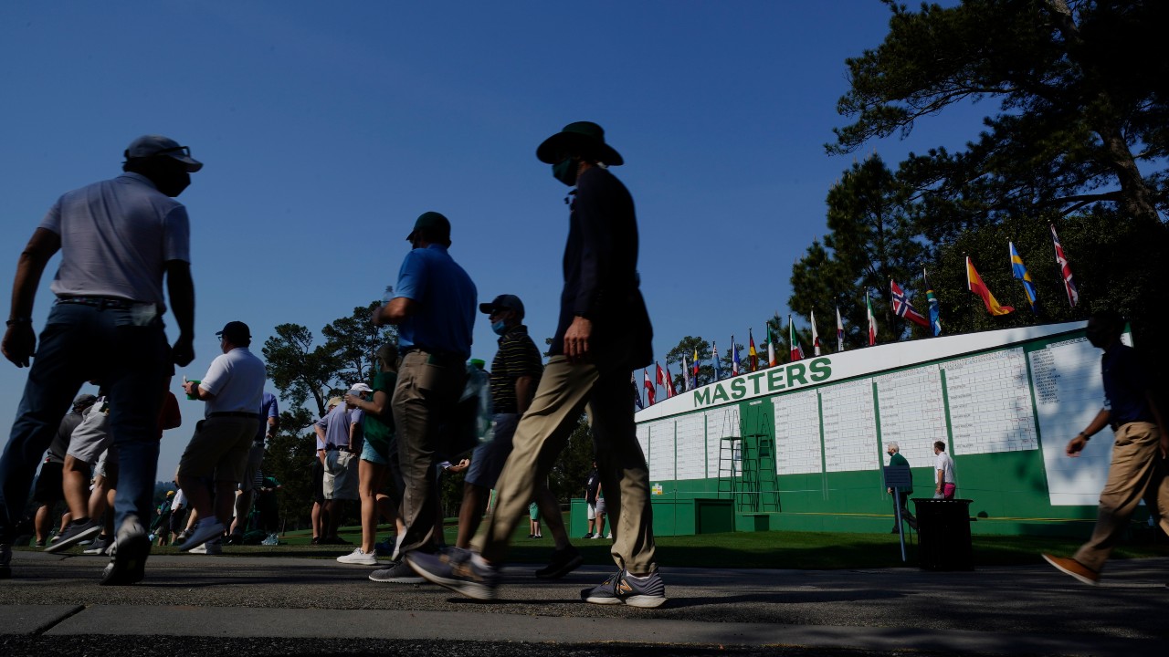 Spectators arrive at Augusta National Golf Course for a practice round for the Masters golf tournament on Wednesday, April 7, 2021, in Augusta, Ga. (Charlie Riedel / AP)