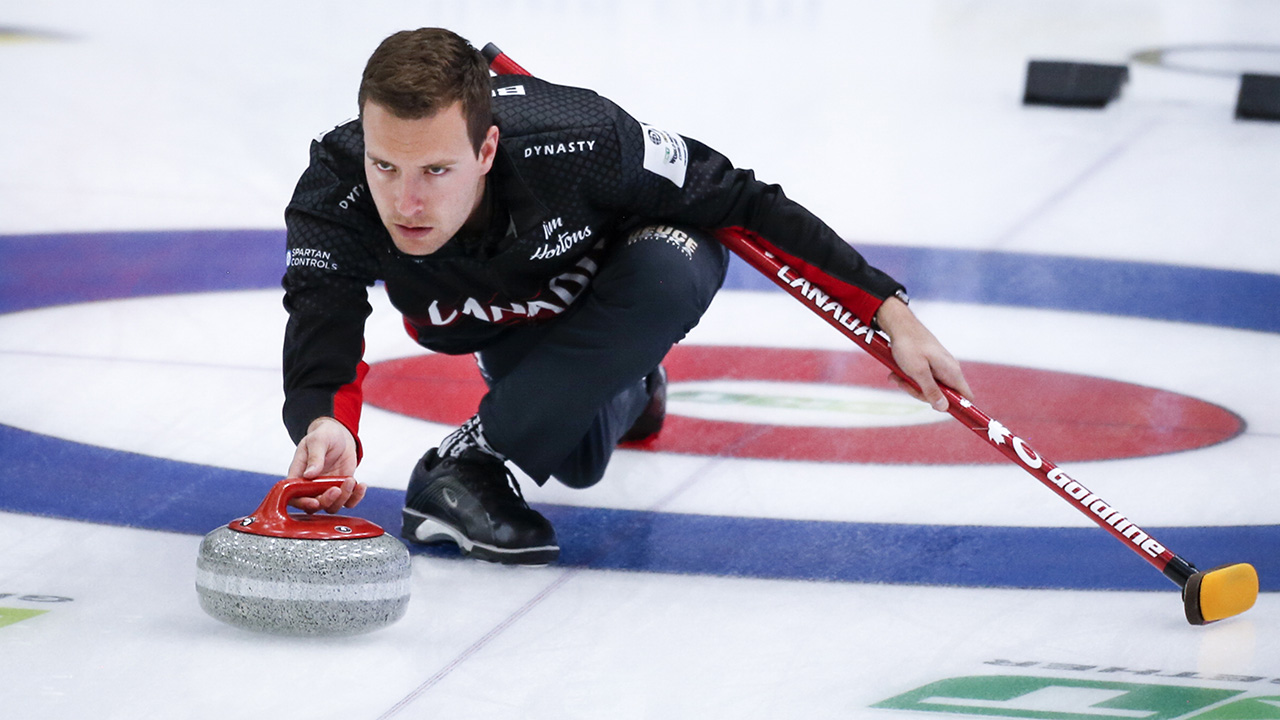 Team Canada skip Brendan Bottcher makes a shot against Russia at the Men's World Curling Championships in Calgary, Alta., Wednesday, April 7, 2021. (Jeff McIntosh/CP)