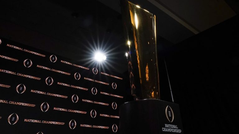 The trophy is displayed before a news conference for the NCAA College Football Playoff national championship game. (David J. Phillip/AP)