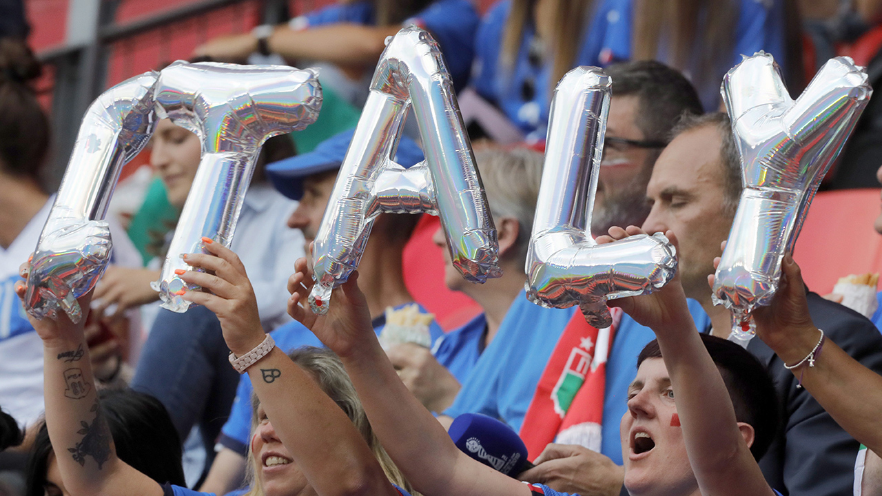 Italy fans support their team prior the Women's World Cup Group C soccer match between Italy and Brazil. (Michel Spingler/AP)