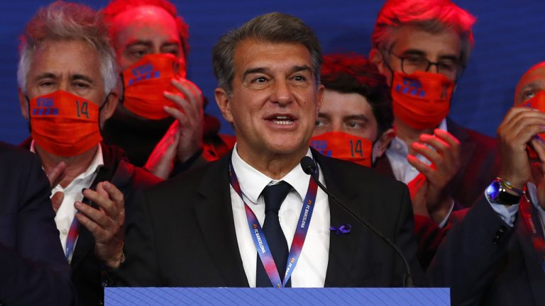 Joan Laporta celebrates his victory after being elected Barcelona's president at the Camp Nou stadium in Barcelona, Spain. (Joan Monfort/AP)