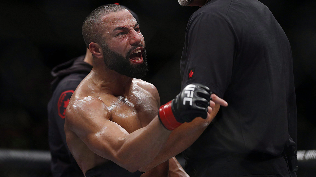 John Makdessi yells at Abel Trujillo after their preliminary lightweight bout at the UFC Fight Night - Lawler vs Dos Anjos event in Winnipeg. (John Woods/CP)