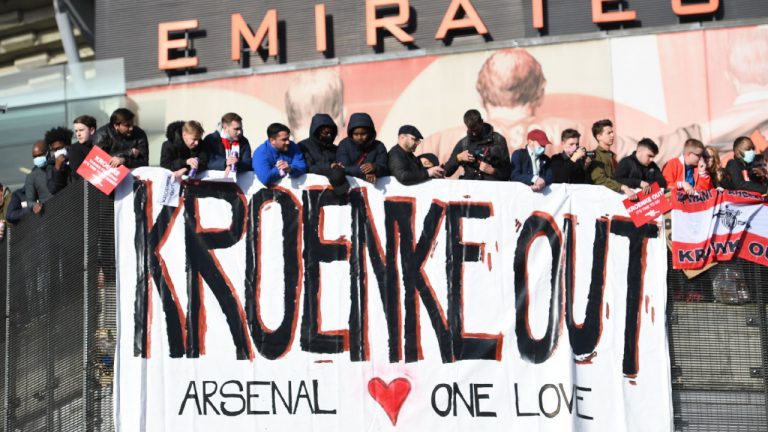 Fans protest against Arsenal owner Stan Kroenke before the English Premier League match against Everton, at the Emirates Stadium in London.  (Kirsty O'Connor/AP)