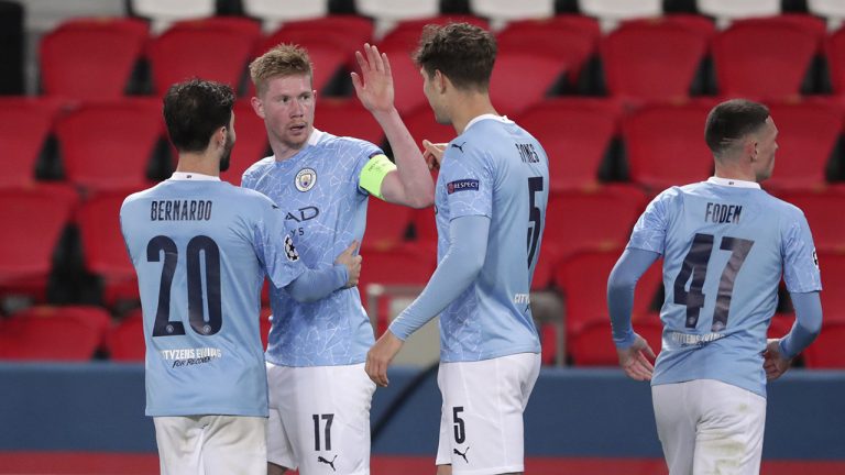 Manchester City's Kevin De Bruyne, 2nd left, celebrates with teammates after scoring his sides first goal during the Champions League semifinal first leg soccer match between Paris Saint Germain and Manchester City. (Thibault Camus/AP)