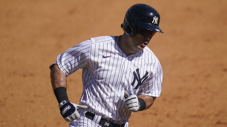 New York Yankees' Mike Tauchman runs the bases after hitting a home run during the fifth inning of a spring baseball game against the Toronto Blue. (Frank Franklin II/AP)