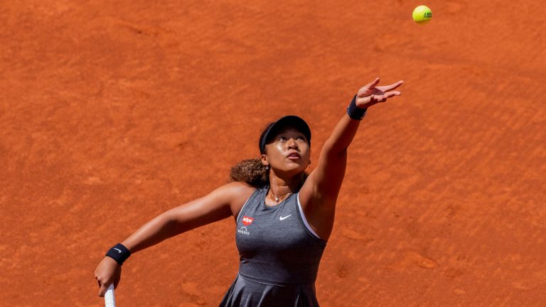 Naomi Osaka serves to Misaki Doi during their match at the Mutua Madrid Open. (Bernat Armangue/AP)