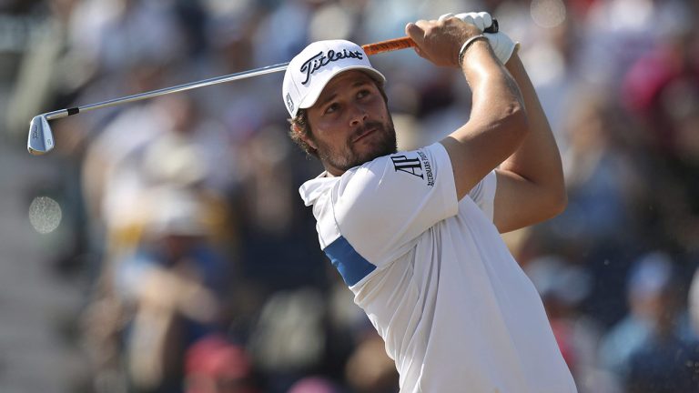 Peter Uihlein of the US plays off the 3rd tee during the first round of the British Open Golf Championship. (Jon Super/AP)