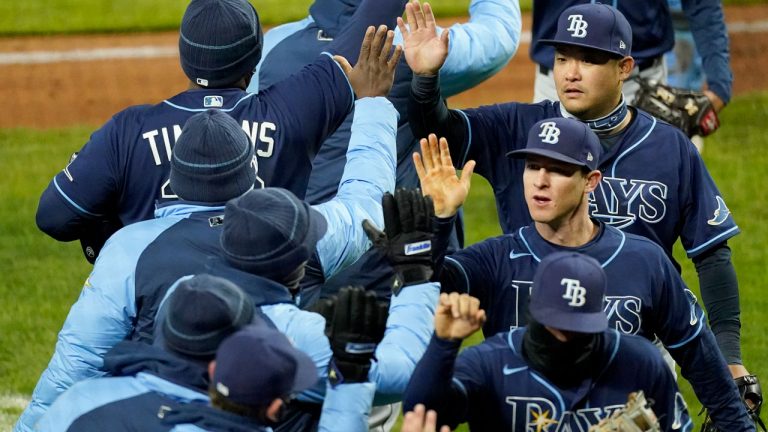 Tampa Bay Rays celebrate after a baseball game against the Kansas City Royals on Tuesday, April 20, 2021, in Kansas City, Mo. The Rays won 14-7. (Charlie Riedel/AP)