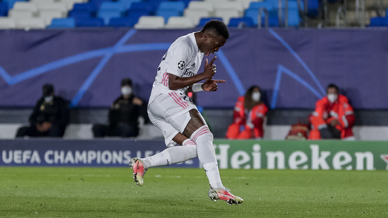 Real Madrid's Vinicius Junior celebrates after scoring his second goal during the Champions League quarterfinal first leg, soccer match between Real Madrid and Liverpool. (Manu Fernandez/AP)
