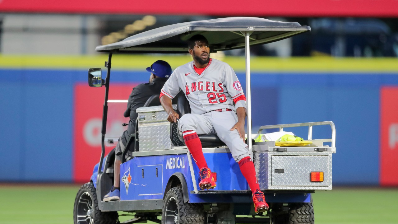 Los Angeles Angels' Dexter Fowler is carted off after a play at second base against the Toronto Blue Jays during the second inning of a baseball game Friday, April 9, 2021, in Dunedin, Fla. (AP Photo/Mike Carlson)