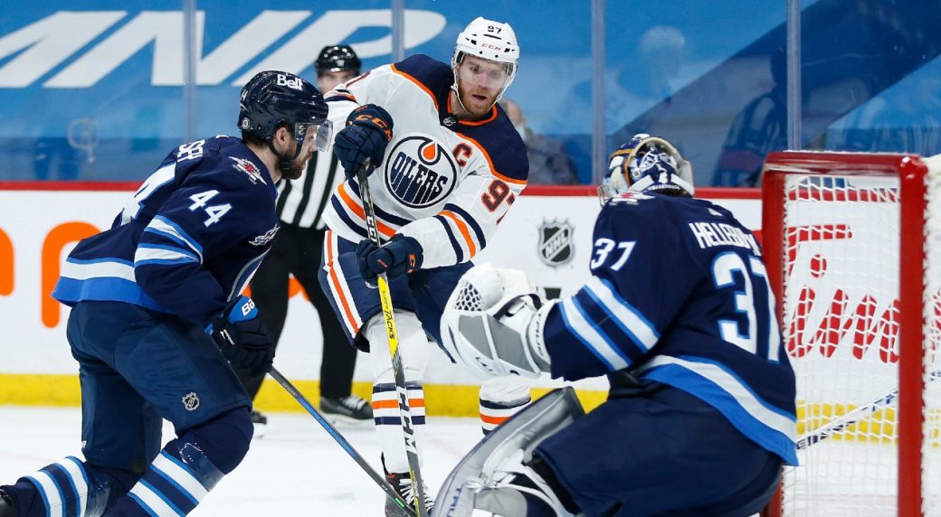 Jets' losing streak continues as McDavid and the Oilers take the win