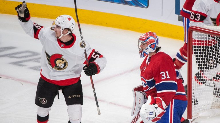 Montreal Canadiens goaltender Carey Price looks on as Ottawa Senators' Alex Formenton reacts to a goal by teammate Artem Anisimov (not shown) during third period NHL hockey action in Montreal, Saturday, April 3, 2021. (Graham Hughes/CP)