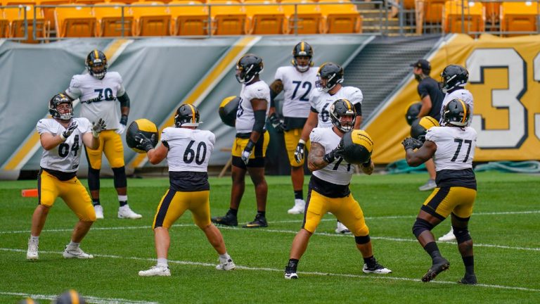 Pittsburgh Steelers offensive linemen John Keenoy (64), J.C. Hassenauer (60), Matt Feiler (71) and offensive tackle Derwin Gray (77) toss medicine balls as they work out during an NFL football training camp practice, Monday, Aug. 31, 2020, in Pittsburgh. (Keith Srakocic/AP)