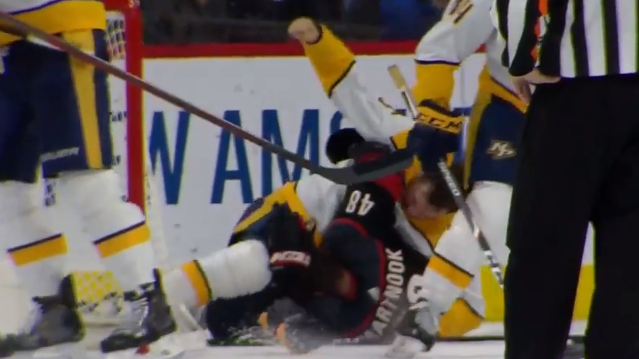 Benning unleashes haymakers on Martinook while both down on ice thumbnail