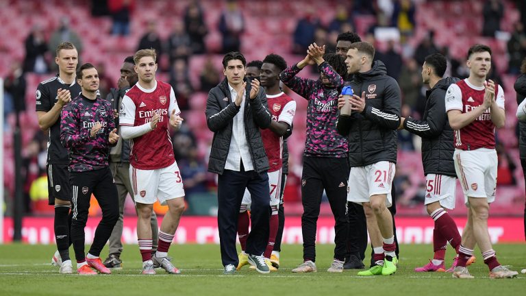 Arsenal players applaud the fans after the English Premier League soccer match between Arsenal and Brighton &amp; Hove Albion at Emirates Stadium in London, England, Sunday, May 23, 2021. (AP Photo/Alastair Grant, Pool)